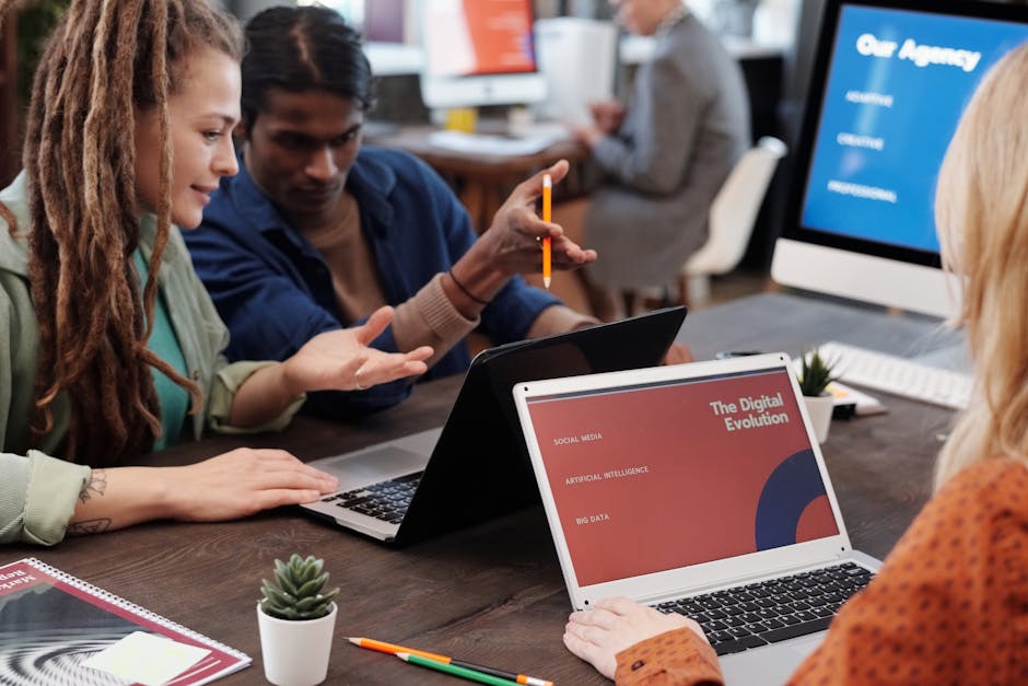diverse team collaborating in a modern office setting - ROI of Enterprise App Development: What C-Level Executives Need to Know