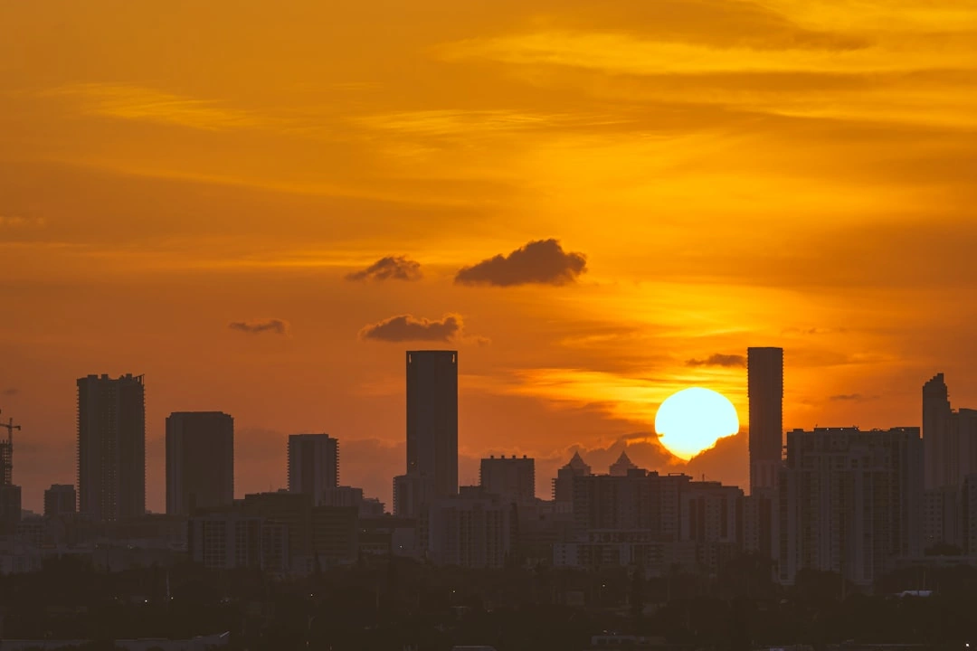 Miami skyline at sunset with modern tech buildings - app development miami Miami skyline at sunset with modern tech buildings - app development miami
