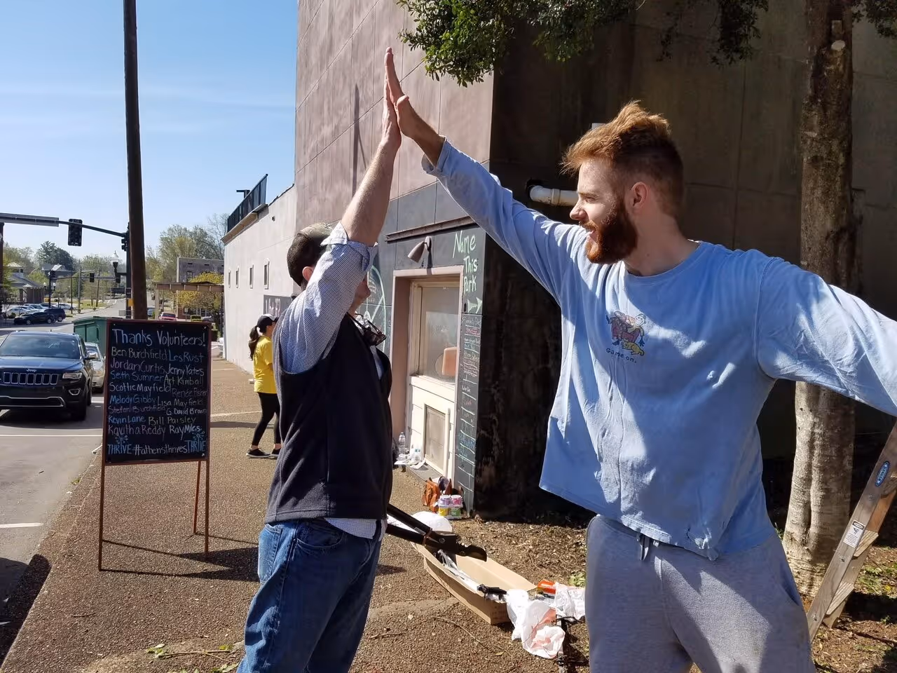 During the second round of Thriving Communities, volunteers in Athens, Tennessee clean up a vacant lot downtown which will eventually become “Pocket Park,” a space for community gatherings and arts programs.
