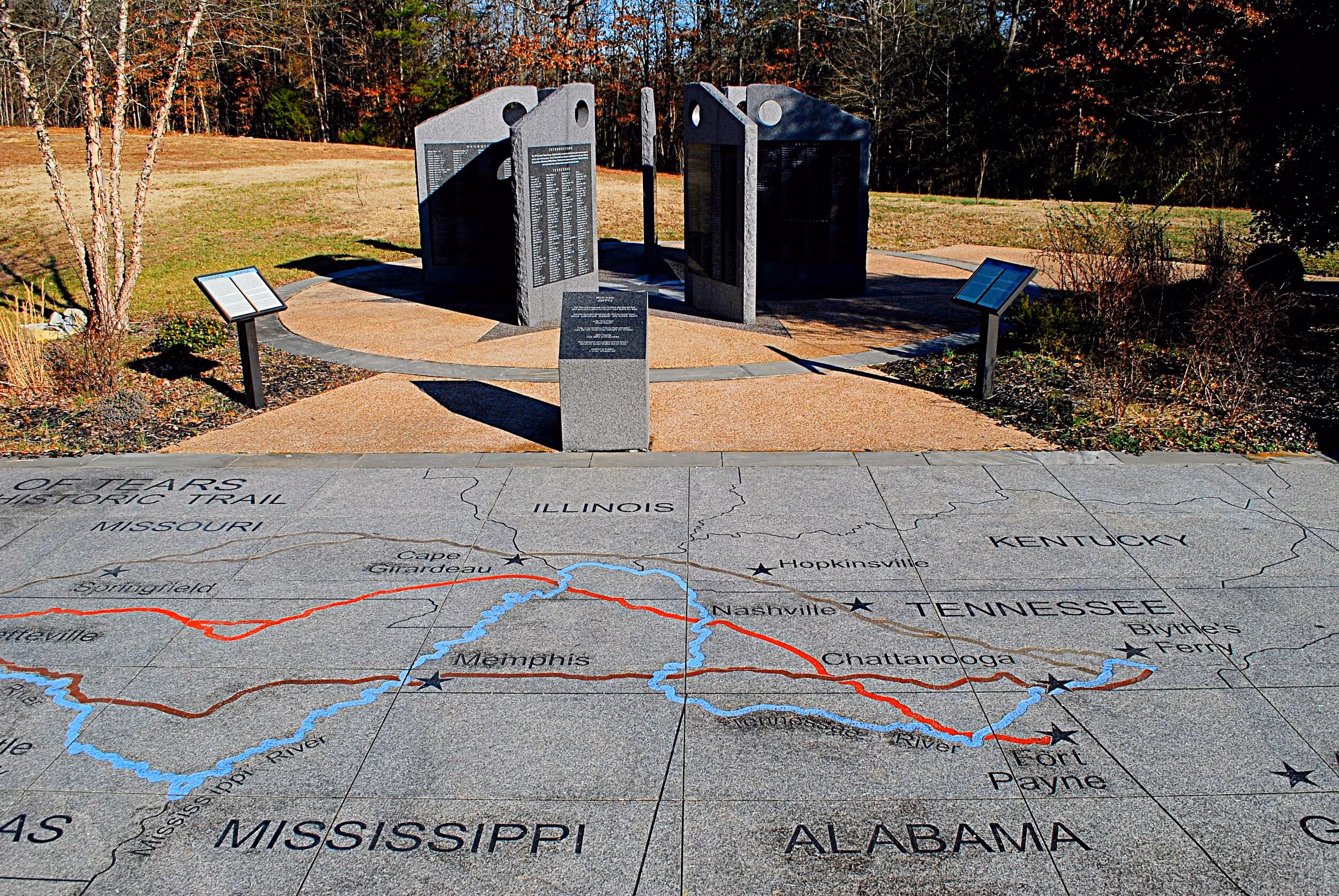 The Memorial Wall behind a map showing Trail of Tears routes. Photo © Bob Butters
