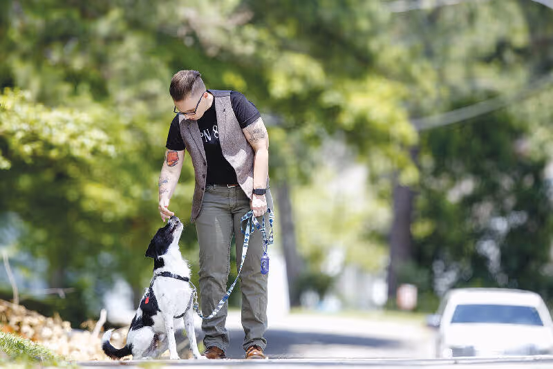 Shannon and her dog Sully. Photo: C.B. Schmelter