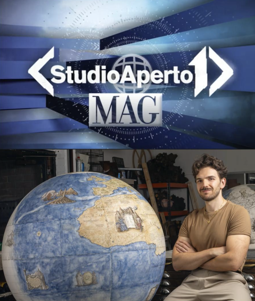 talian artist and globe maker Leonardo Frigo in his London studio with a handmade terrestrial globe, featured on Studio Aperto MAG on Italia 1.
