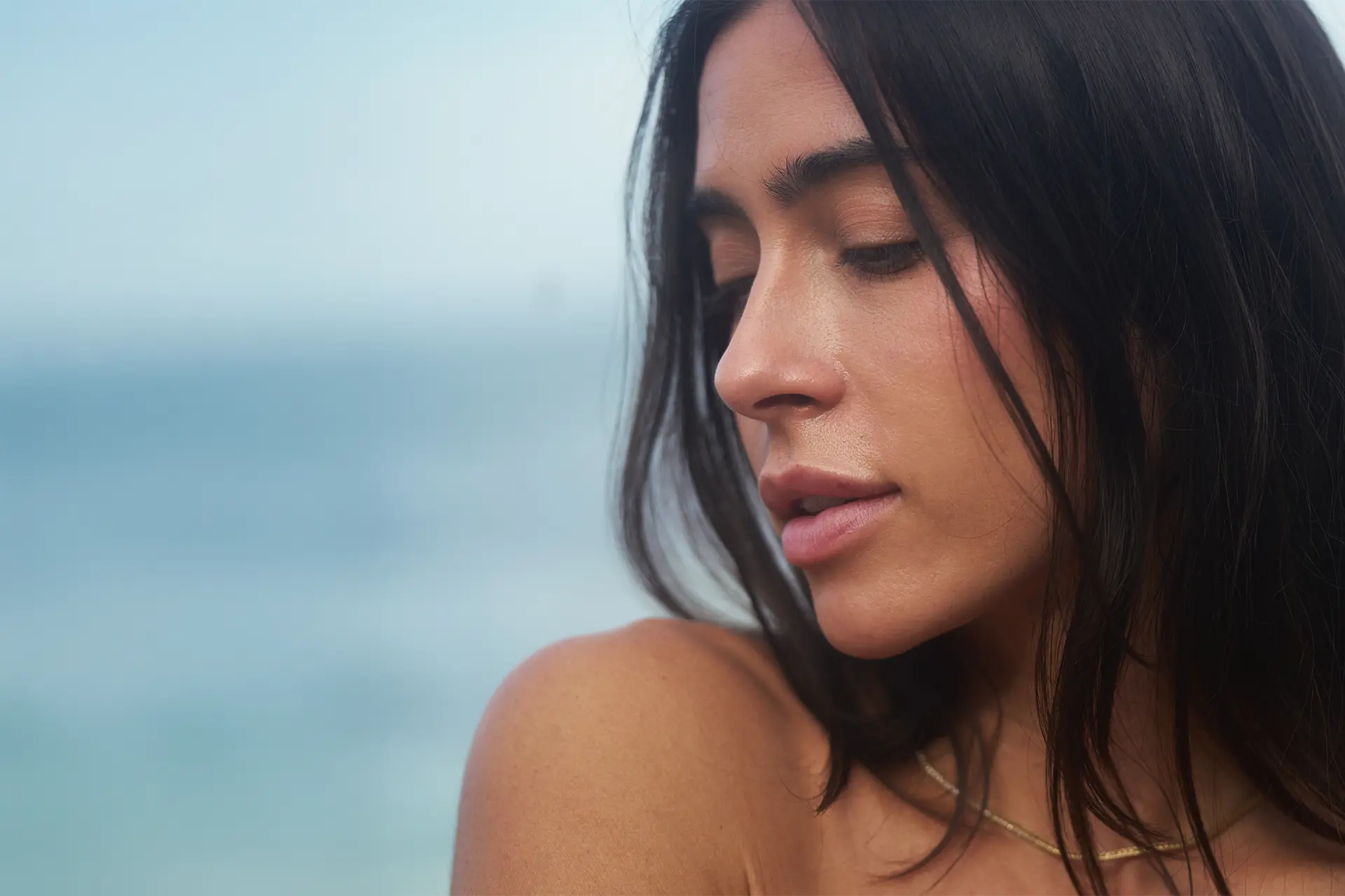 Young woman with balanced facial symmetry that is natural-looking