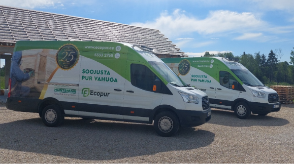 A group of white and green vansAI-generated content may be incorrect.