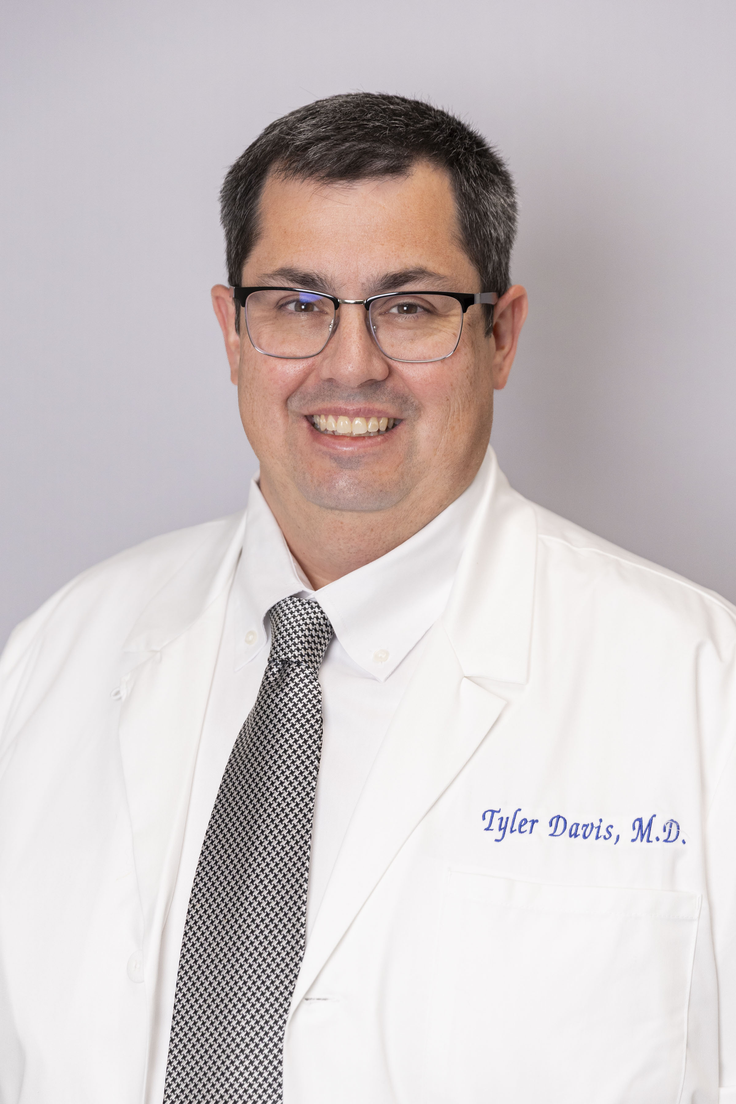 Headshot of Tyler Davis, MD, FACP