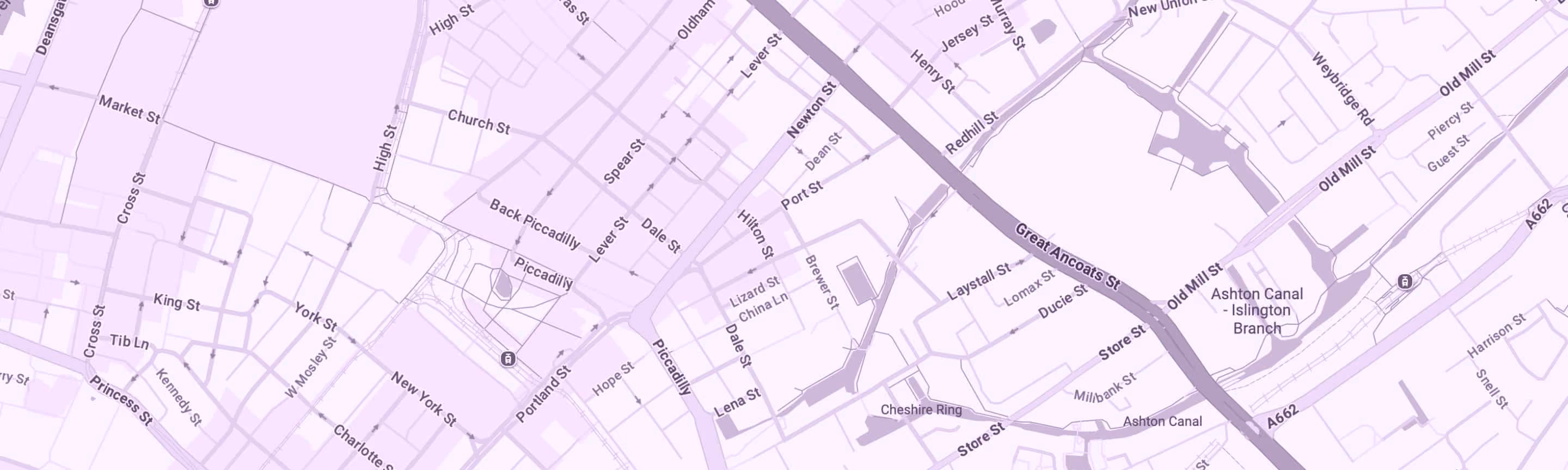 Map of city streets including Piccadilly, King St, New York St, and Ashton Canal branch.