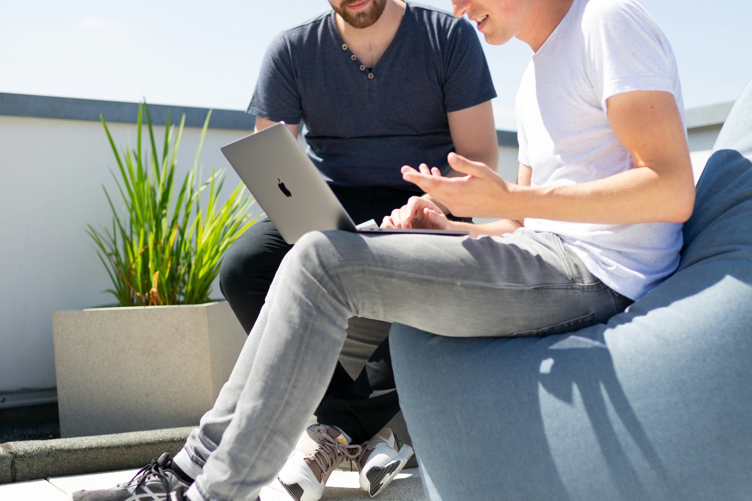 man working on a laptop - Mailstrom vs. Clean Email