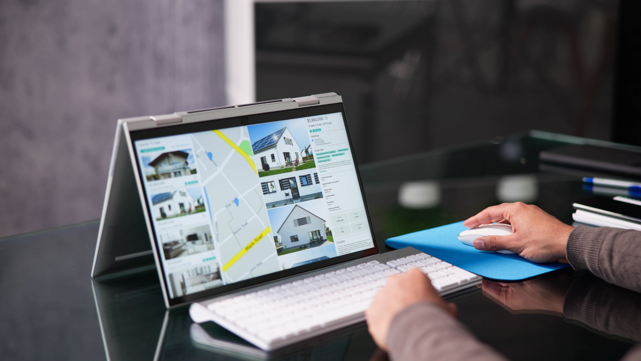 Homeowner updating FSBO property listing on computer using Flat Fee MLS service in California