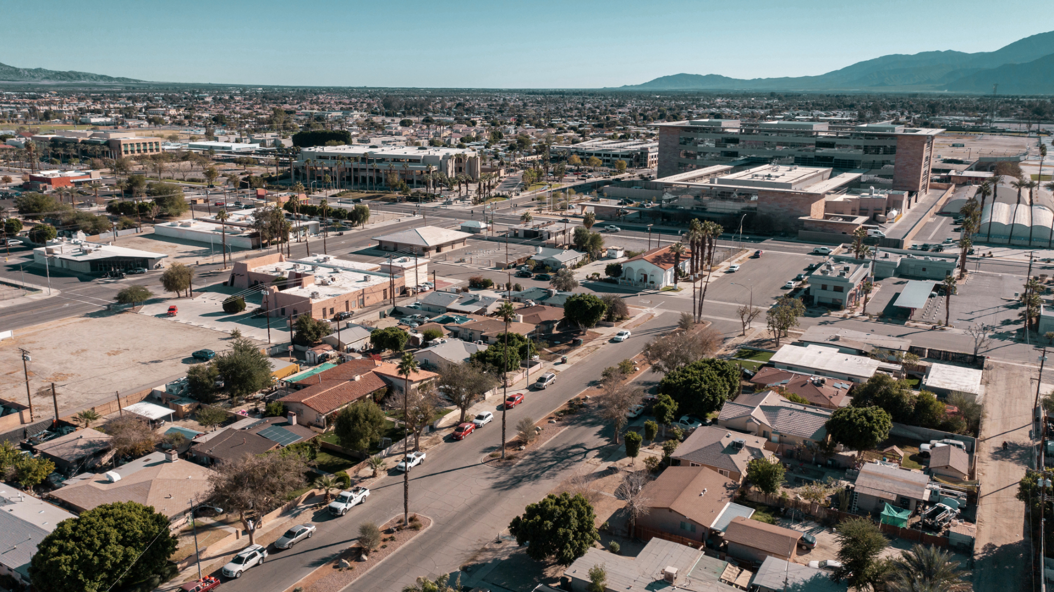 Aerial view of homes and neighborhood streets in Indio, California, where FSBO sellers can list on the CRMLS