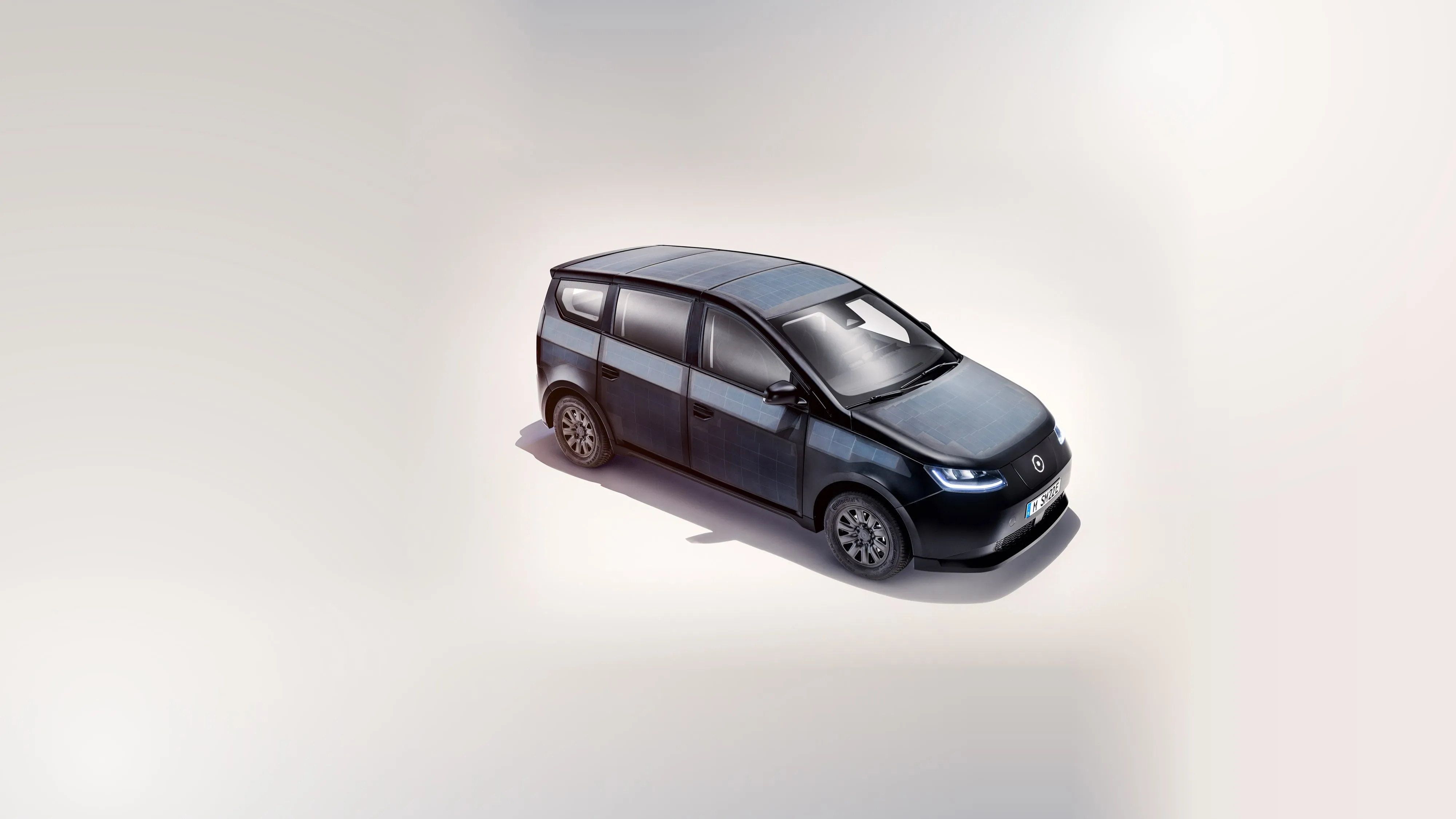 a black car with a white background