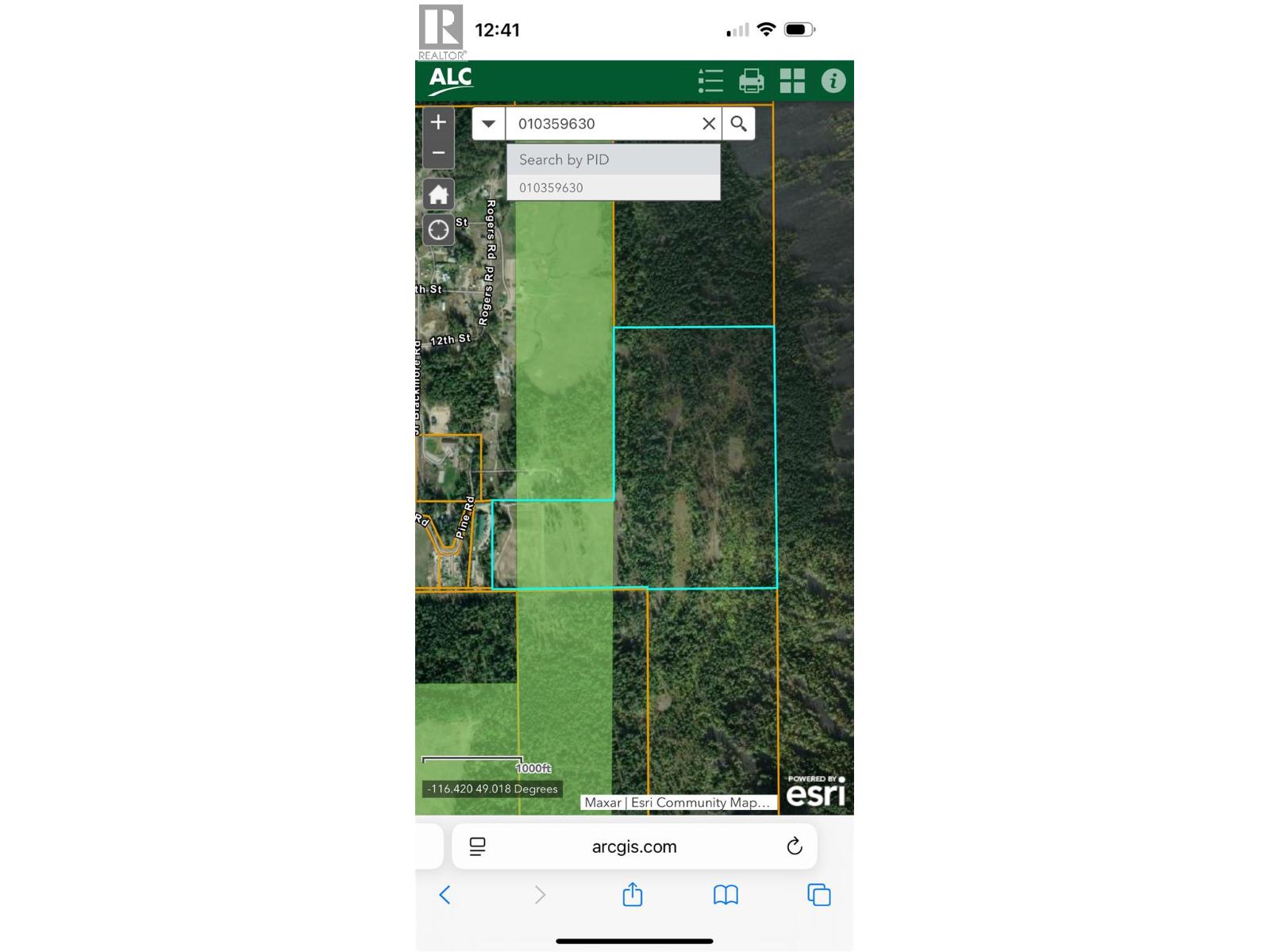 Property outline and ALR shaded in green .