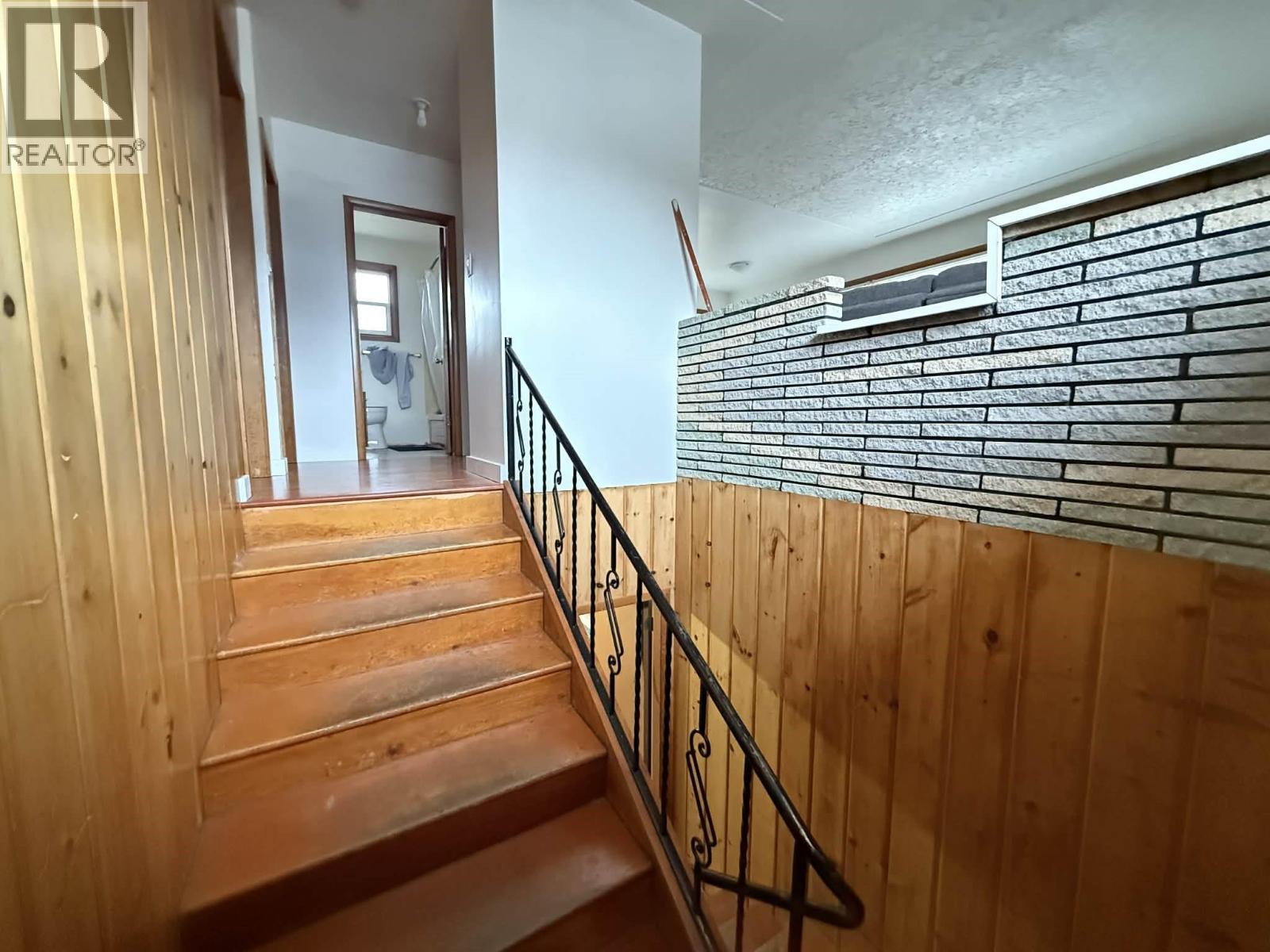 Stairs leading to two bedroom suite.
