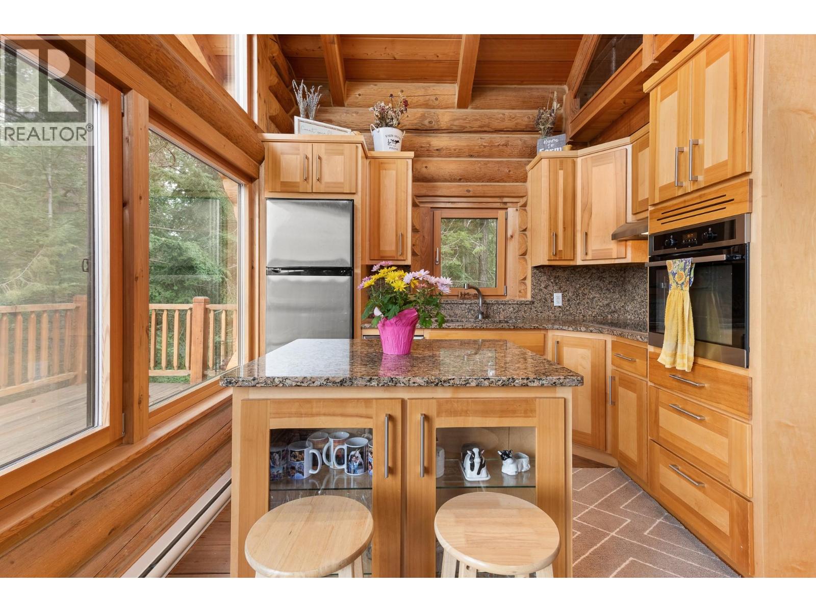 Cozy Kitchen with built in oven and cooktop