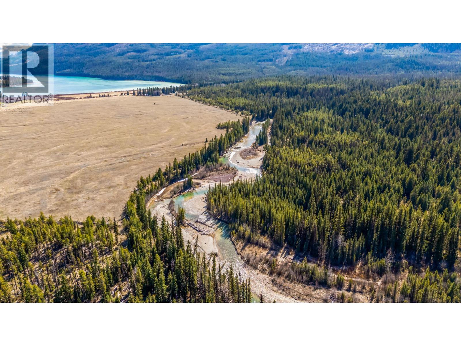 Expansive meadowland with Dutch Creek winding through the property