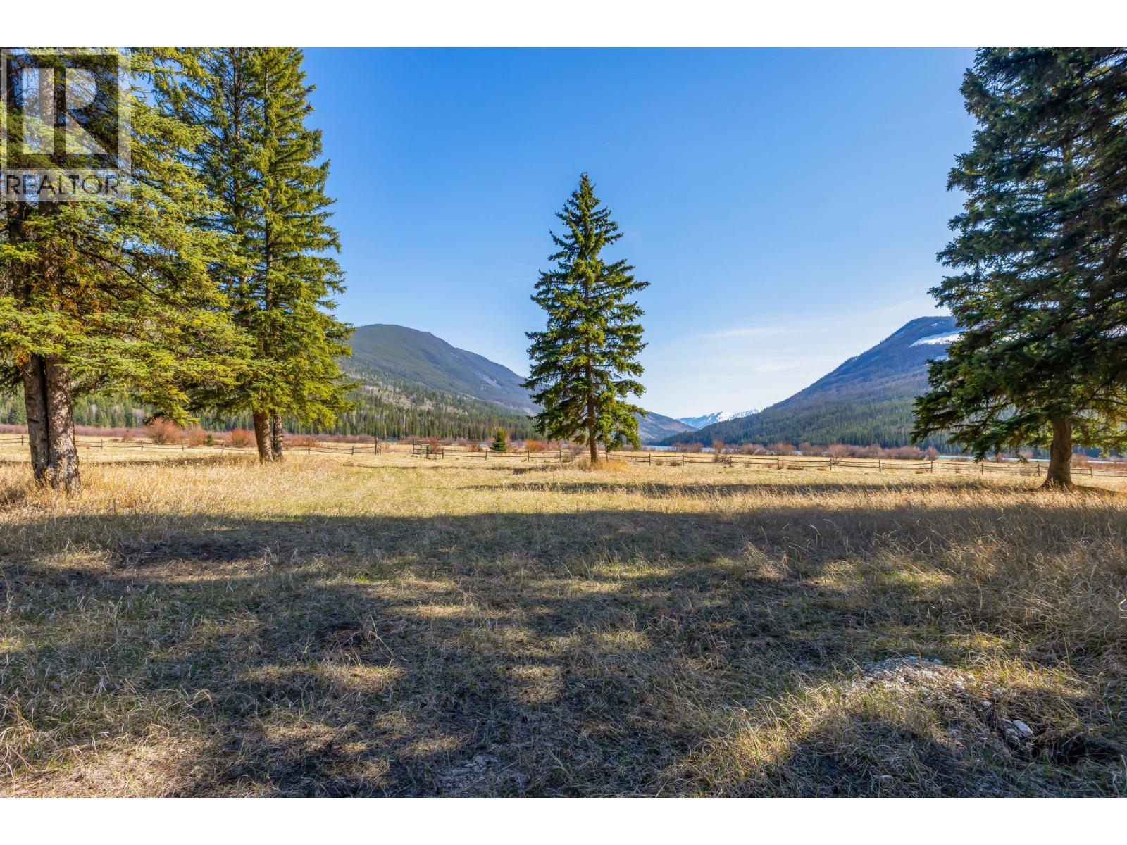Open land framed by the Rockies and endless sky