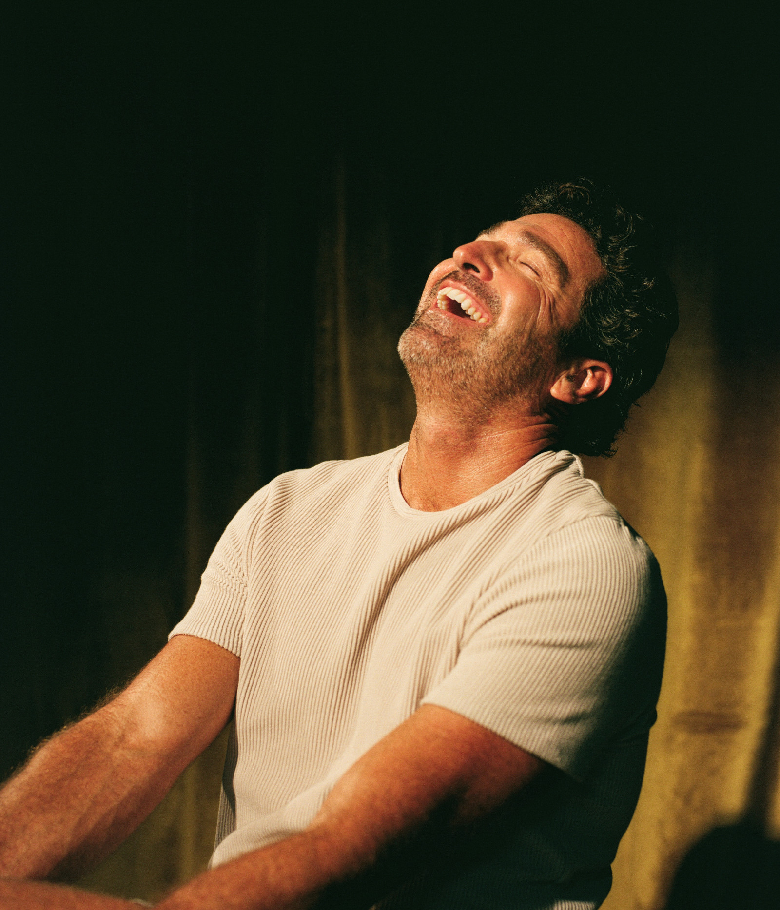 Man laughing with confidence — renewed self-assurance