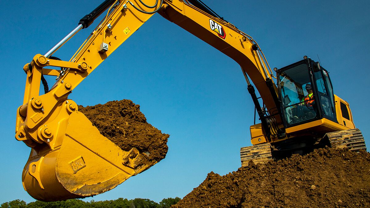 Excavator digging soil on construction site during ground-up commercial building project in Los Angeles for Build Solutions