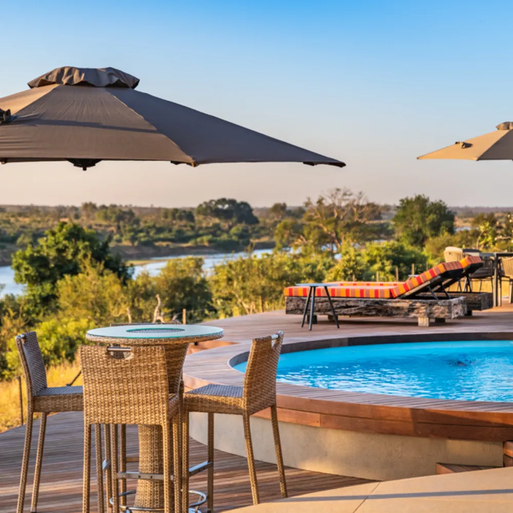 Luxury lodge pool facing Crocodile River in Mjejane