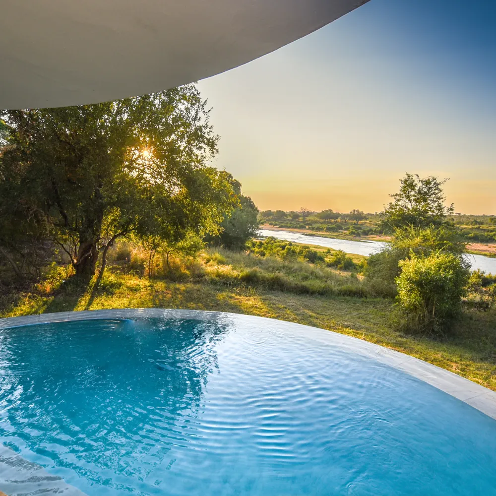Mjejane lodge with riverfront views