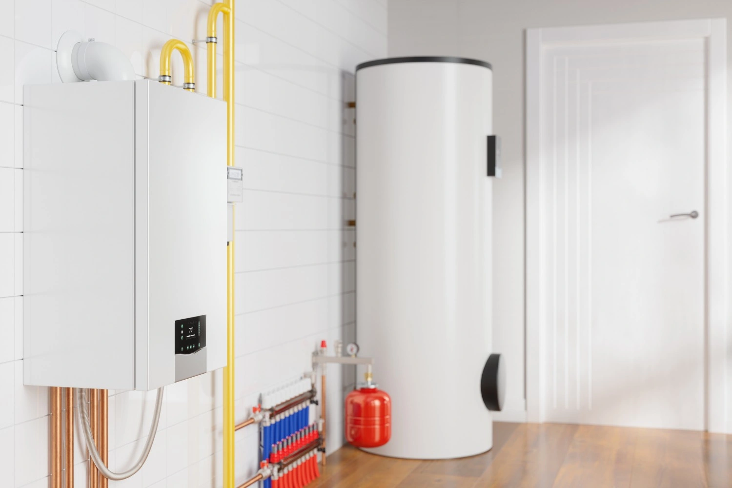 A large, modern, white boiler is mounted on a white tile wall, with a matching hot water tank and yellow pipes next to it.