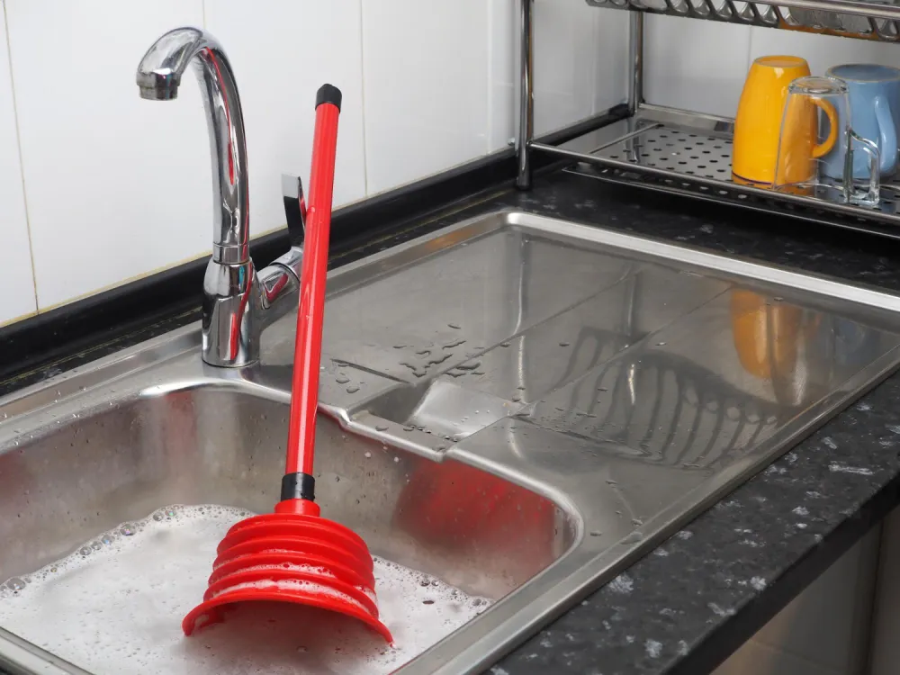 How Our Professionals Fix a Kitchen Sink Clogged Problem