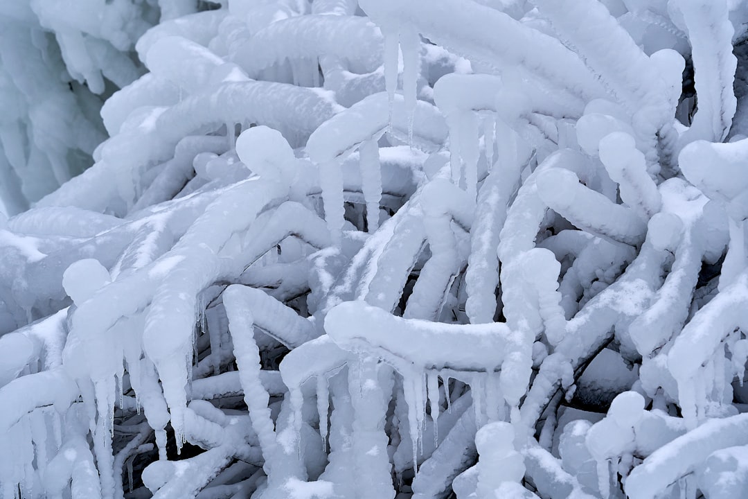ice forming on outdoor AC refrigerant lines ice forming on outdoor AC refrigerant lines