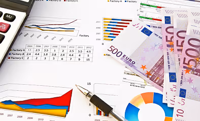 Charts and euro banknotes illustrating investment charges