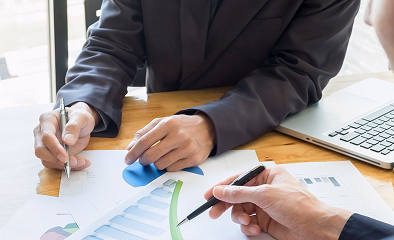 Discussion of investment options using financial charts