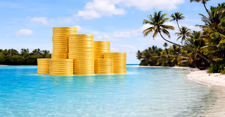 Stacks of gold coins on a beach symbolizing offshore retirement savings and financial planning