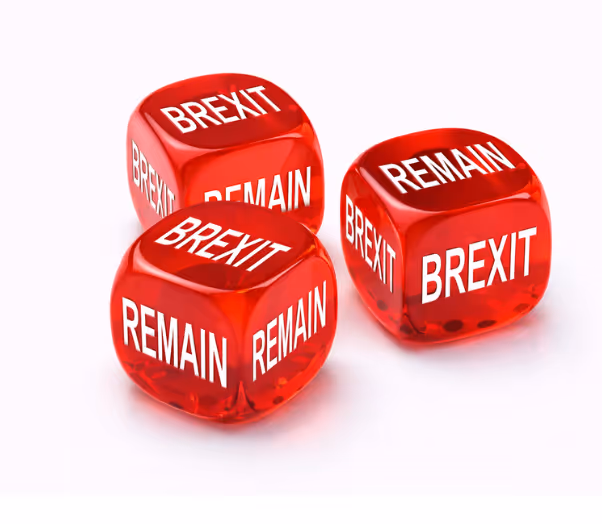 Red dice labeled Brexit and Remain representing uncertainty and chance in Brexit decisions