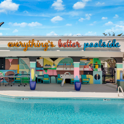 Colorful outdoor bar and mural overlooking the pool at Hotel McCoy.Colorful outdoor bar and mural overlooking the pool at Hotel McCoy