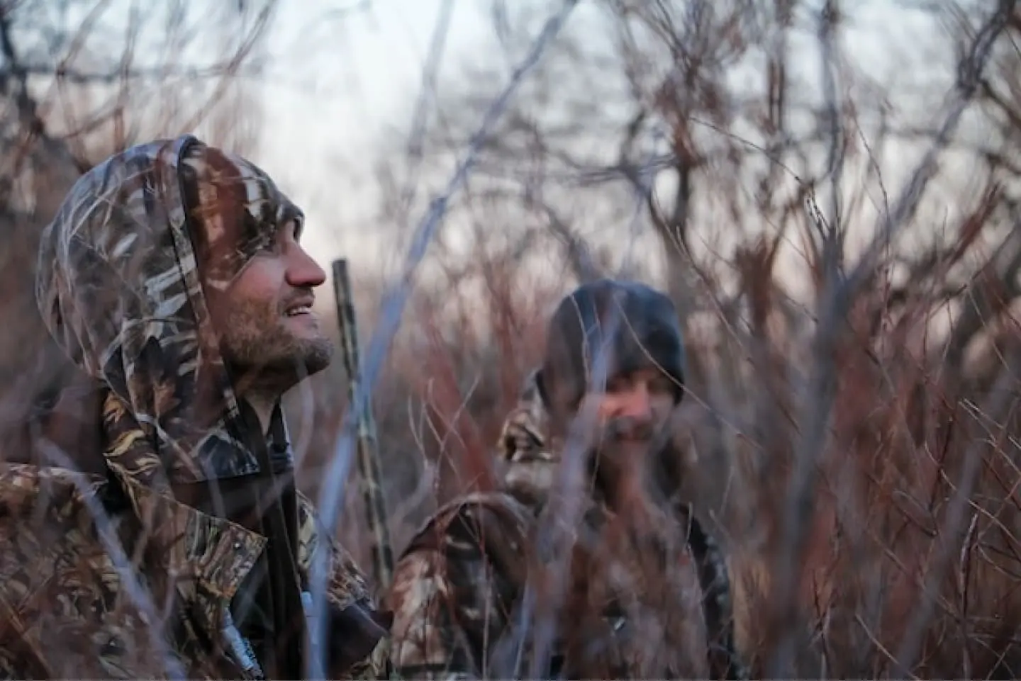 Hunters - two men walking through the brush at El Monte Gringo talking