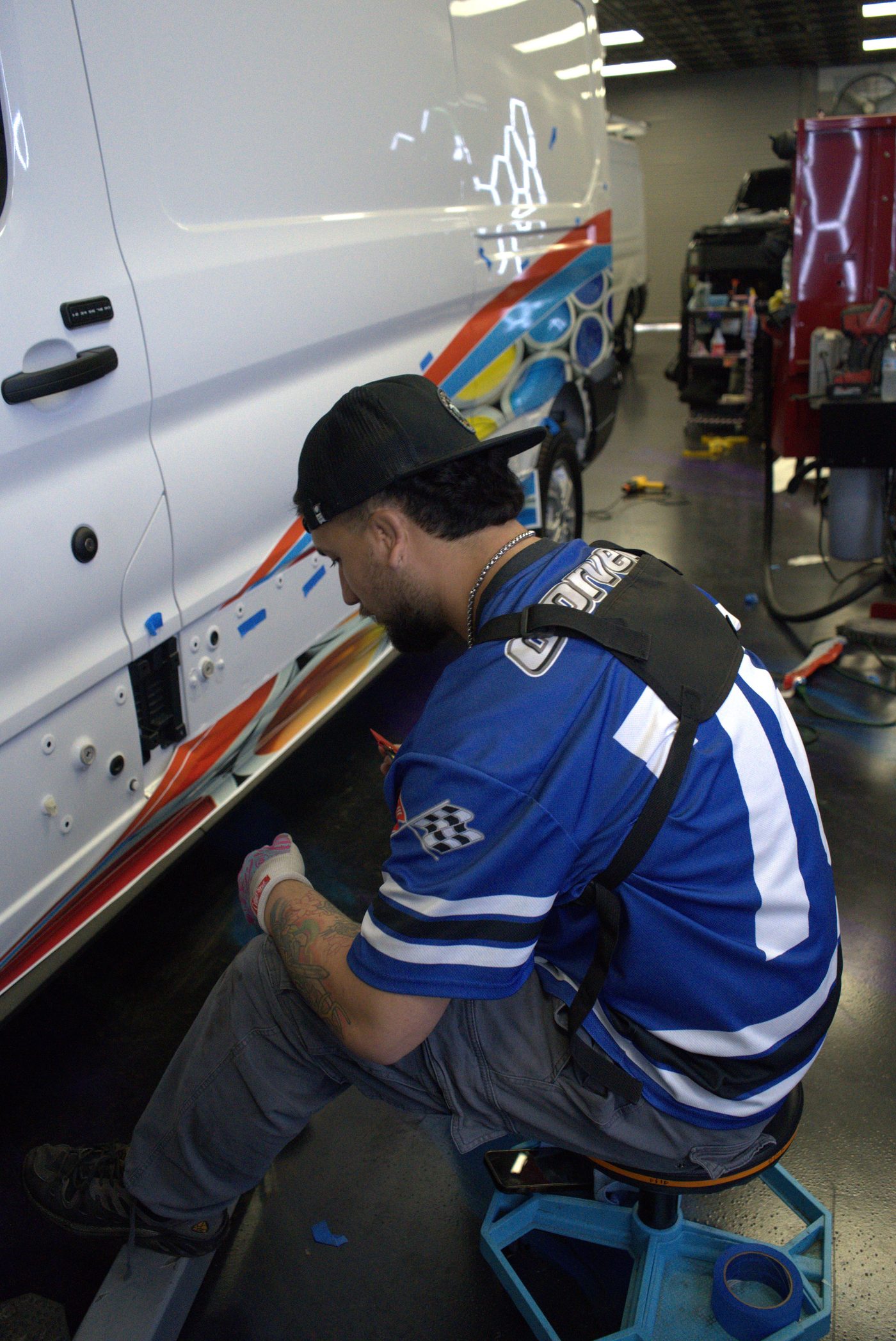 Allure technician installing a commercial wrap
