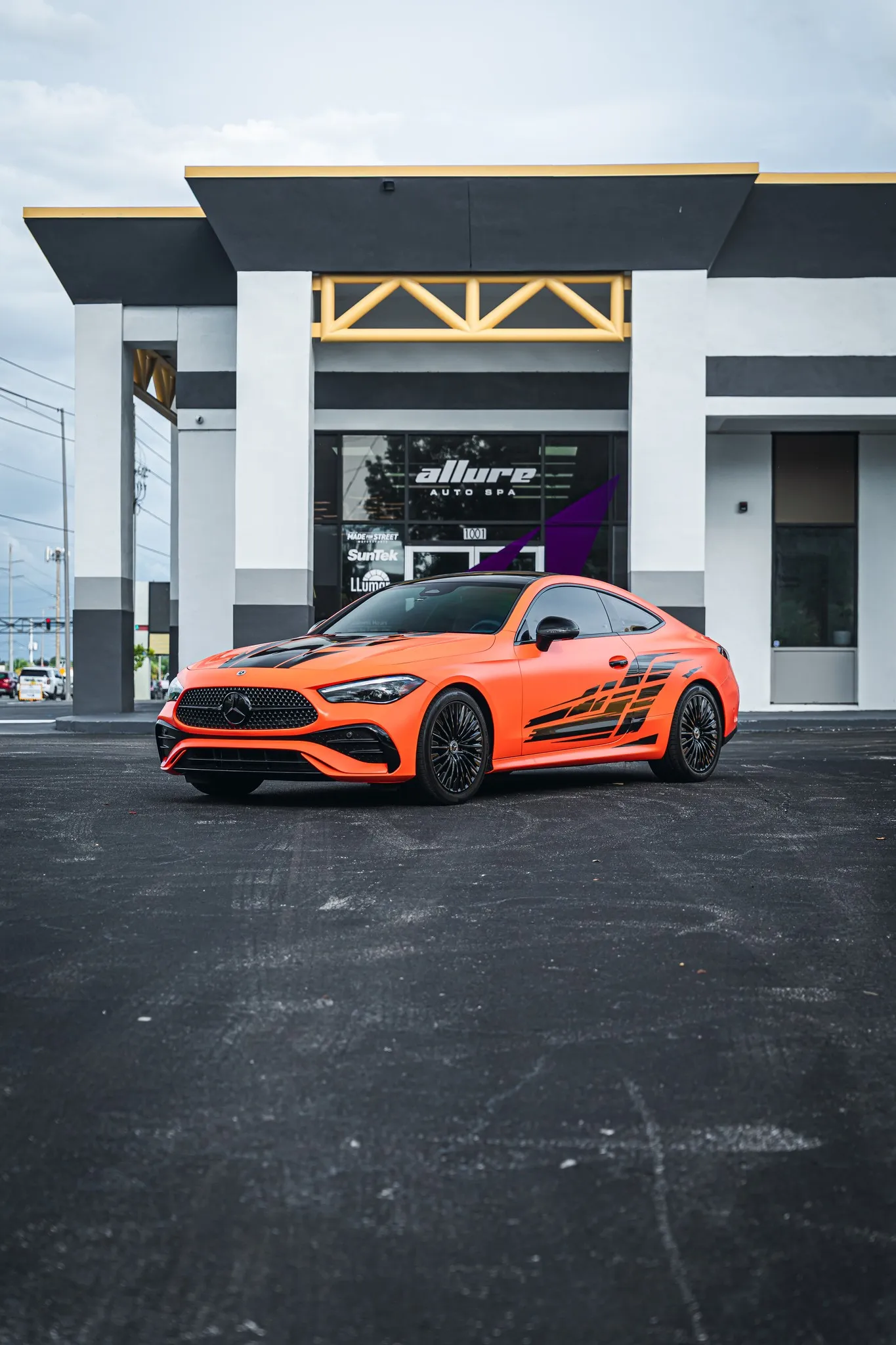 Mercedes CLE300 with gloss orange color paint protection film at Allure Auto Spa, Winter Park FL
