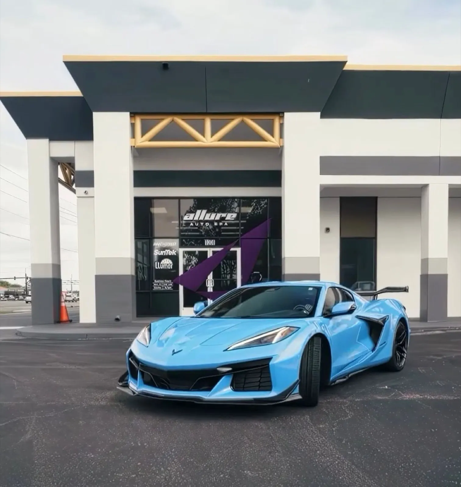 Light blue Chevrolet Corvette Z06 with paint protection film at Allure Auto Spa in Winter Park, FL