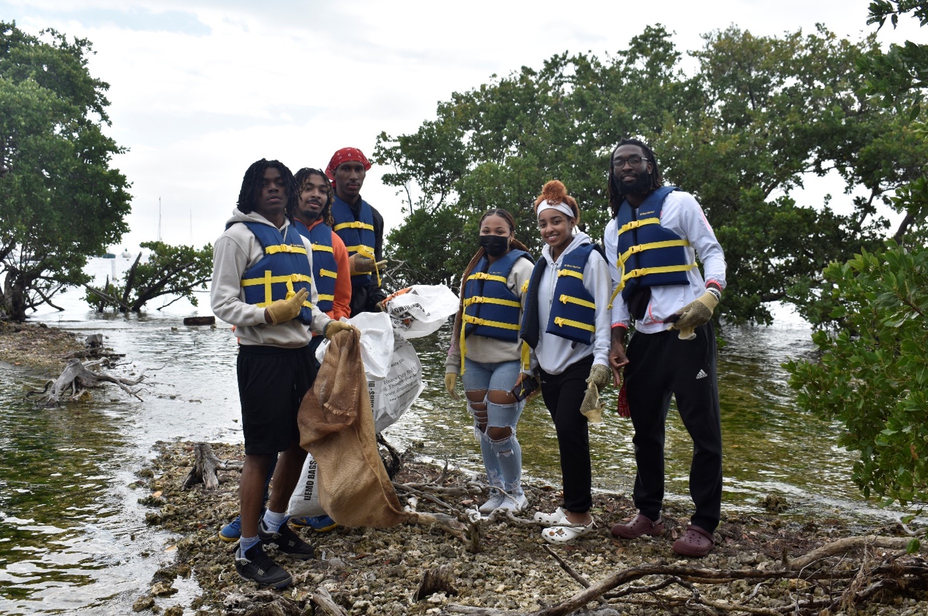 Kappa Alpha Psi joins SALM for a Supper Successful Mangrove Cleanup — story of impact at Shake-A-Leg Miami