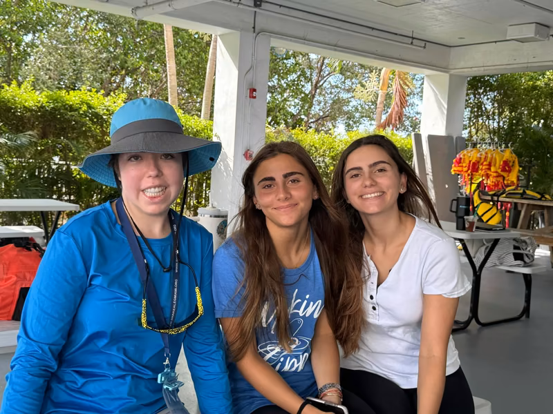 Three mentors under tent