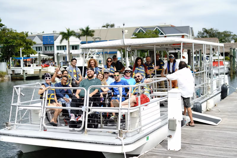 Group aboard pontoon at dock