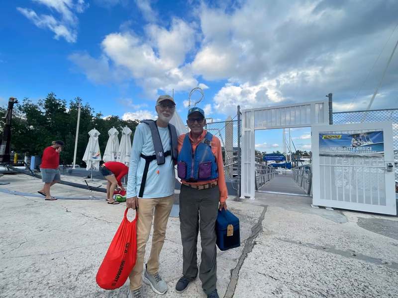 Two sailors heading to the dock