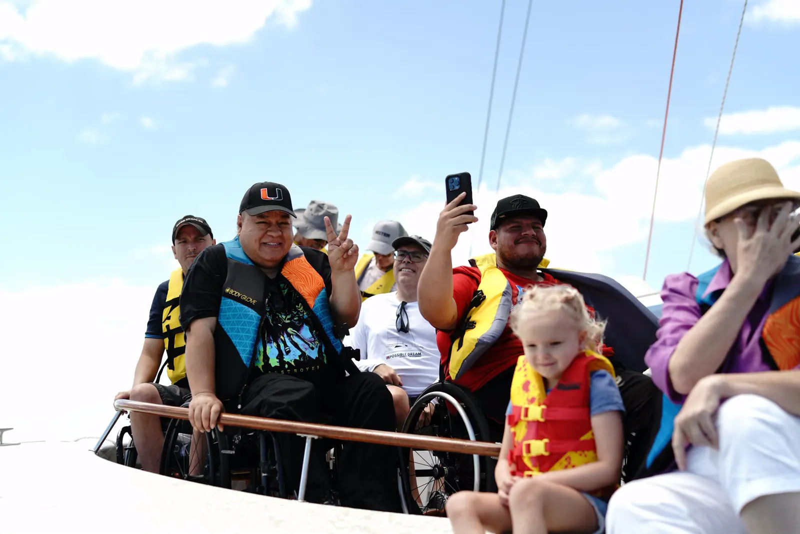 Group selfie aboard catamaran