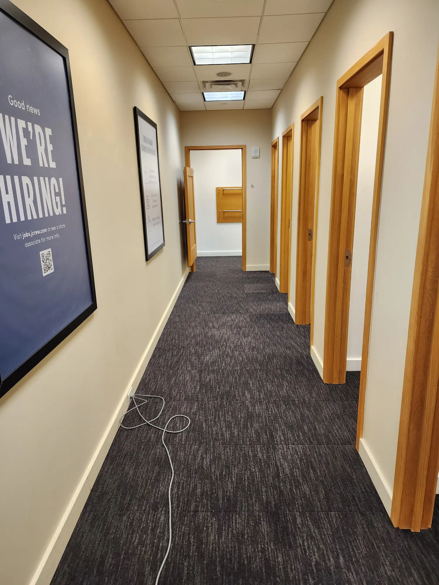 New commercial carpet tile in a renovated hallway by Killian's Contracting Group in Louisville, KY