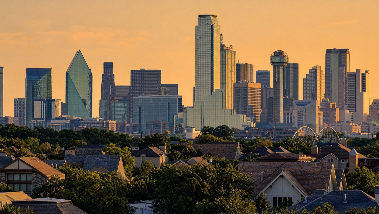 Dallas skyline at golden hour beyond a residential neighborhood