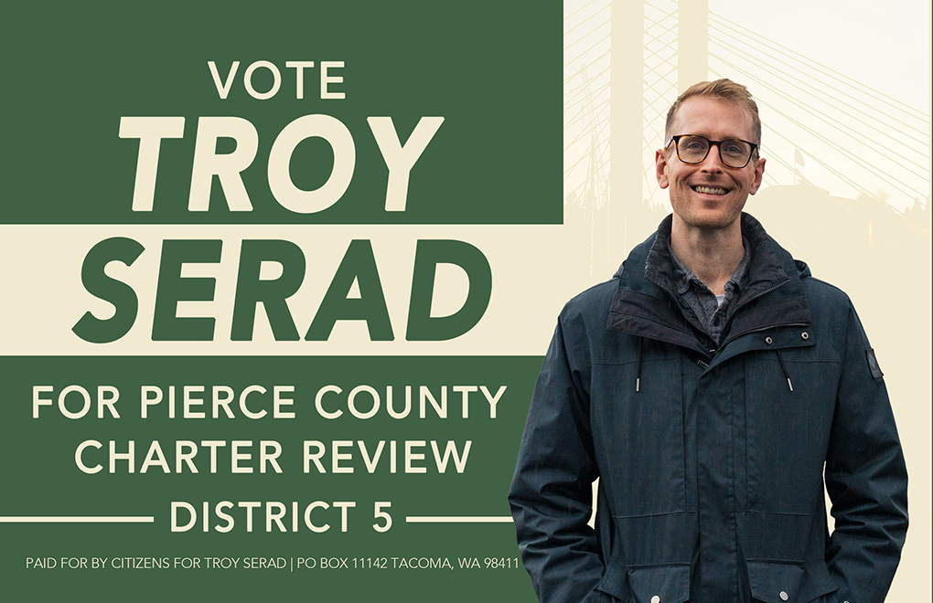 The front of the Vote Troy Serad campaign flyer shows a photo of Troy with text that reads "Vote Troy Serad for Pierce County Charter Review District 5"