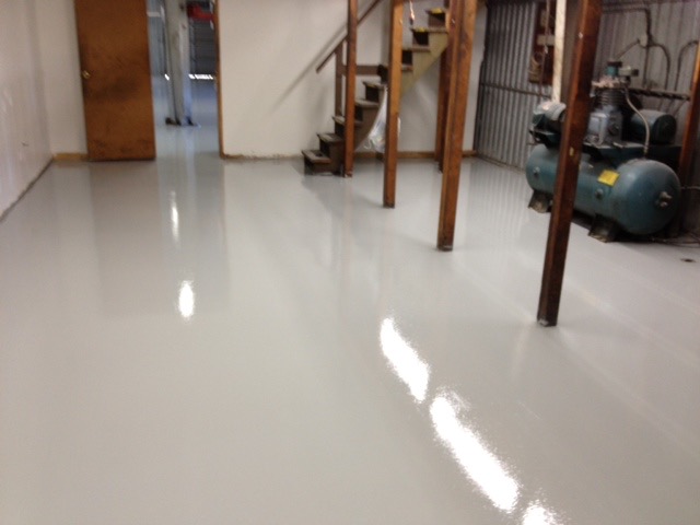Commercial epoxy floor coating at Concours motors in ventura, Ca