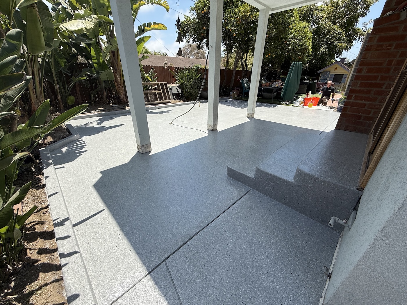 exterior poly aspartic full flake coating installed on patio in ventura