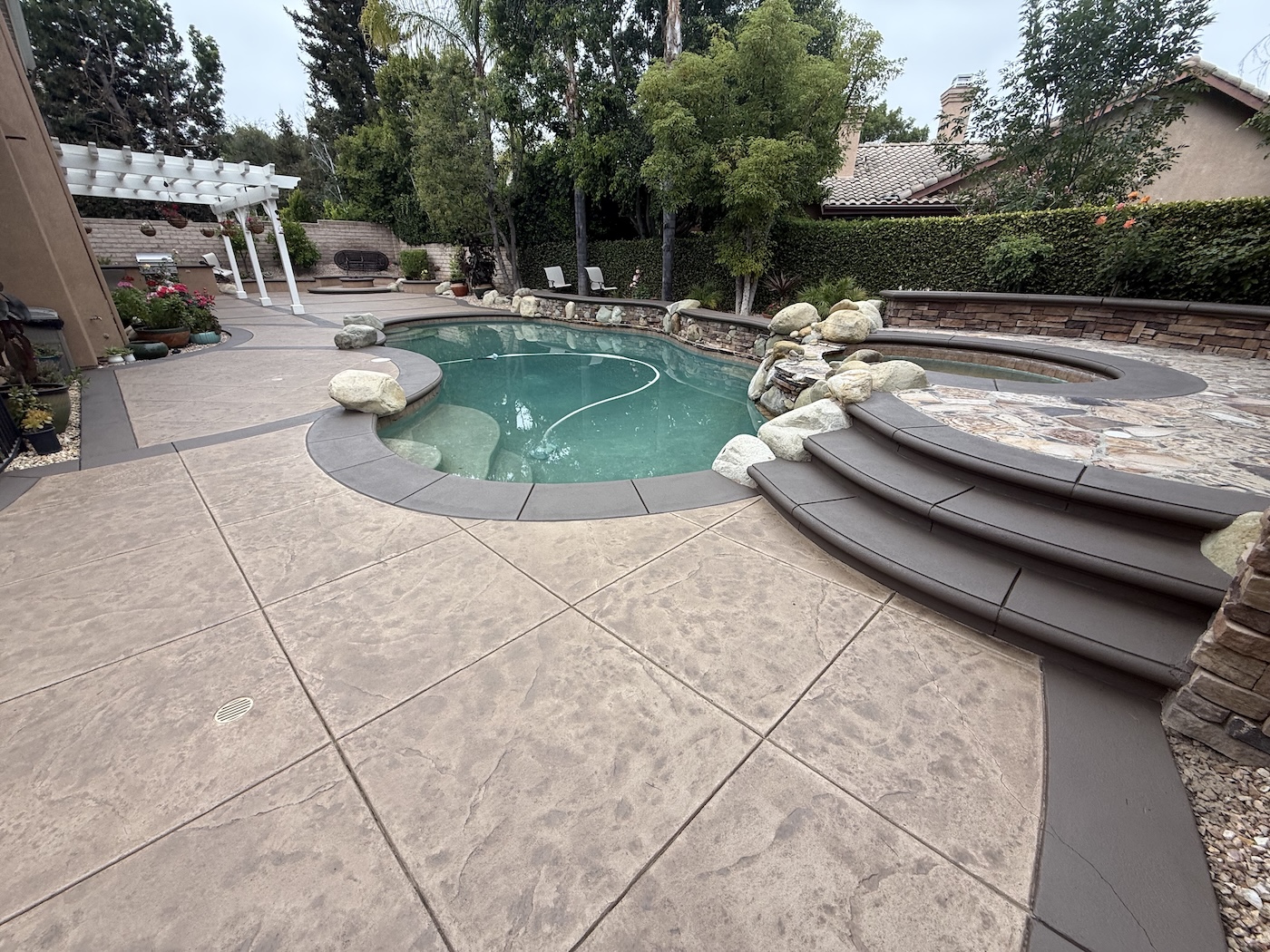 custom stamped concrete pool deck staining in thousand oaks, ca