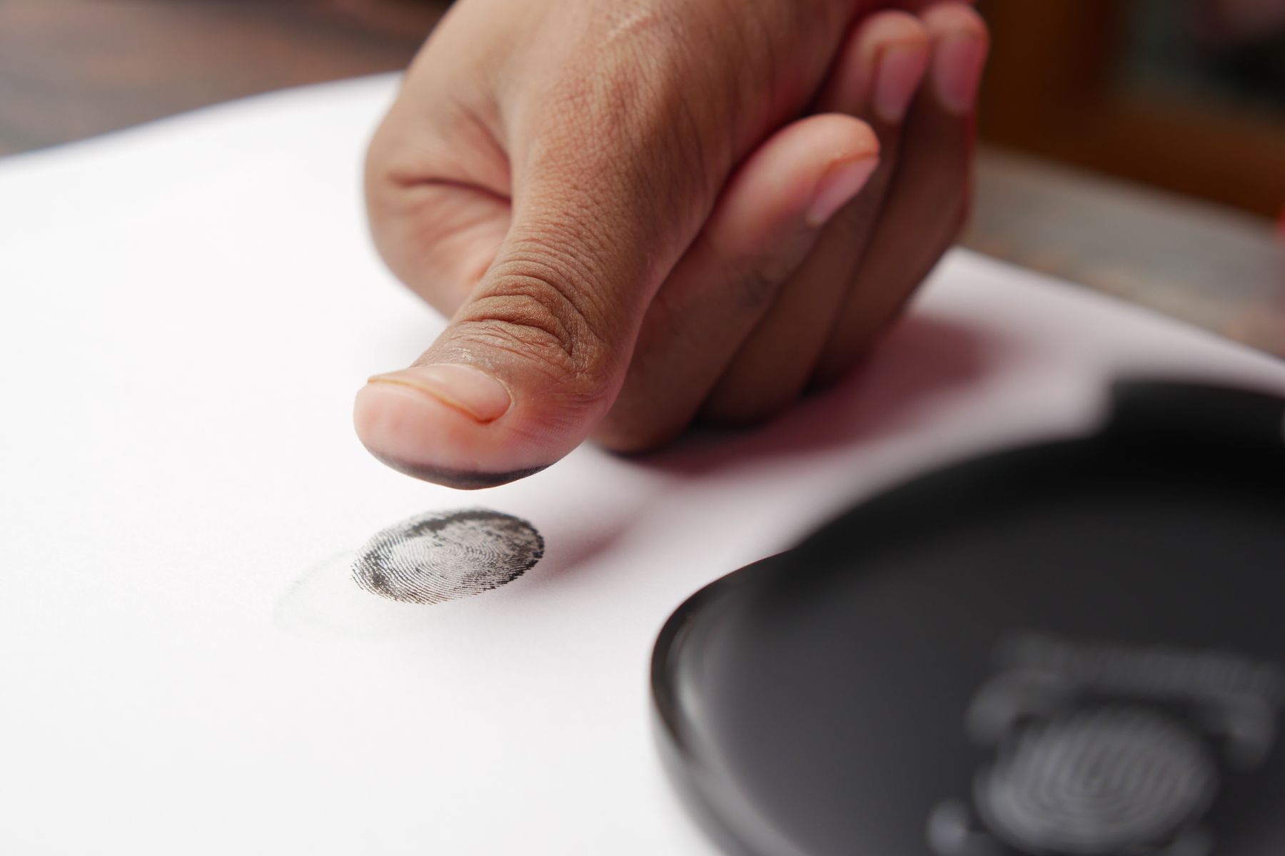 Close-up of a fingerprint being scanned for biometric identity verification