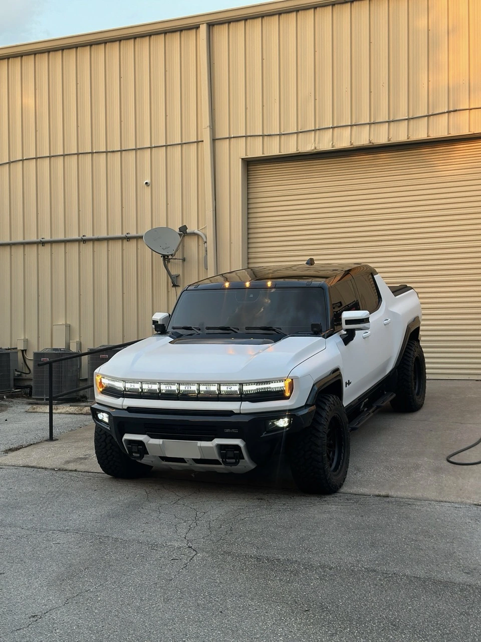 White GMC Hummer EV coated with ceramic finish at Allure Auto Spa in Casselberry, Florida