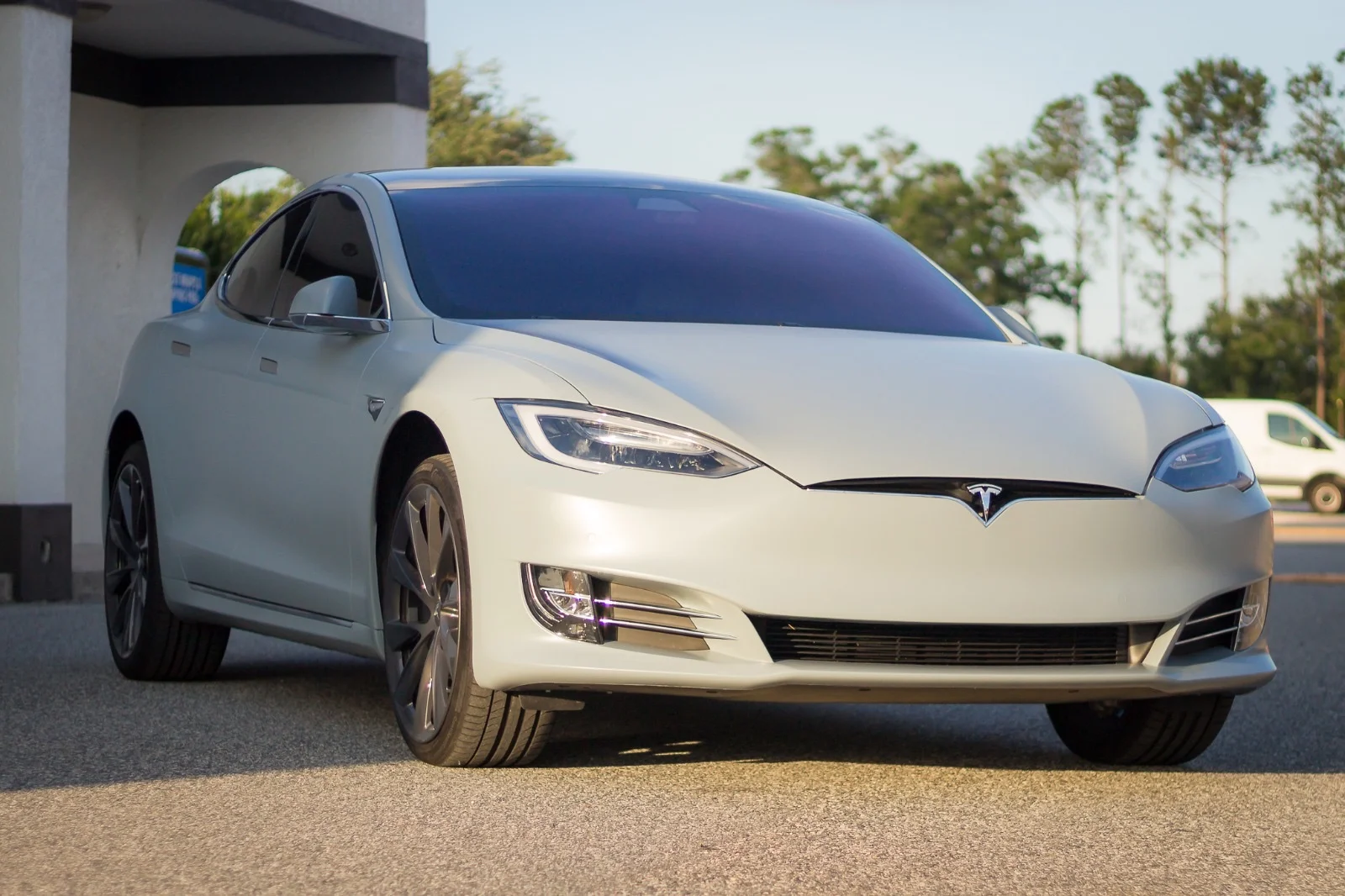 Front view of a Tesla Model S with a new satin grey car wrap, completed by Allure Auto Spa