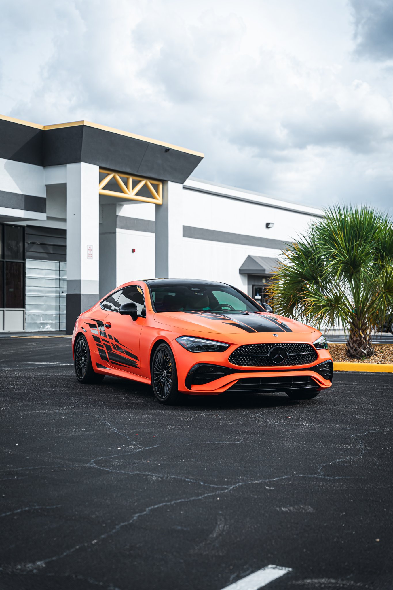 Matte orange Mercedes coupe wrapped by Allure Auto Spa